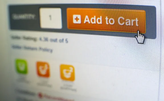 Mouse clicking add to cart button in an E-commerce Website Design
